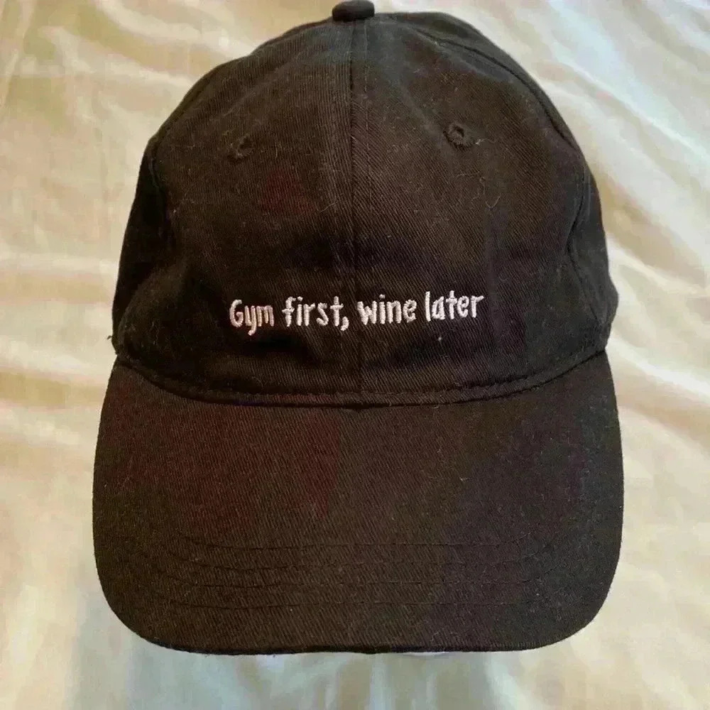 “Gym First, Wine Later” Black Novelty Baseball Hat Cap. One Size Fits Most.